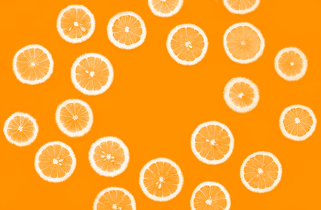 Top view of orange fruit pattern color background.flat lay designの写真素材