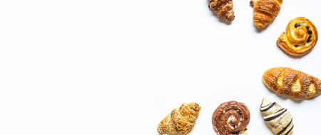Top view of bread and bakery set on white  color background.Food and healthy concepts images,banner sizeの写真素材