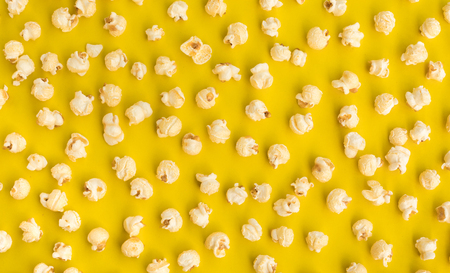 Pop corn on pastel color background.Food and snack concepts ideas.Minimal styleの写真素材