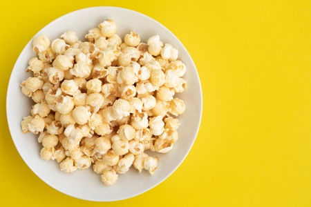 Pop corn on pastel color background.Food and snack concepts ideas.Minimal styleの写真素材