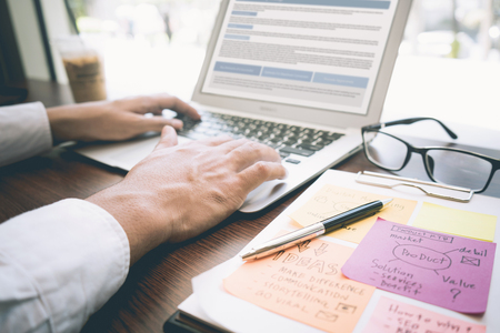 Businessman working using laptop.business technology lifestyle.strategy planning process.research data information concept.modern workplacesの写真素材