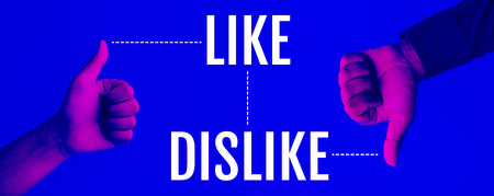 Effect result concepts with two hand showing thumb up presents like and dislike,positive or negative sign on blue background.Business  communication marketing,Motivation ideasの写真素材