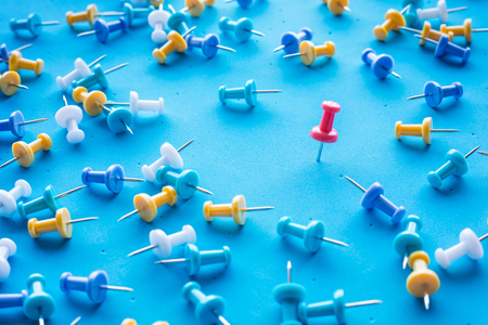Successful concepts with pin,thumbtack on blue color background.Selective focus.business creativity ideasの写真素材