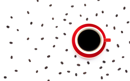 A cup of coffee with beans on white background.top viewの写真素材
