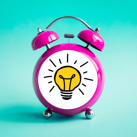 Inspiration ideas concepts with light bulb icon icon in alarm clock.Time and dateline.performance of...