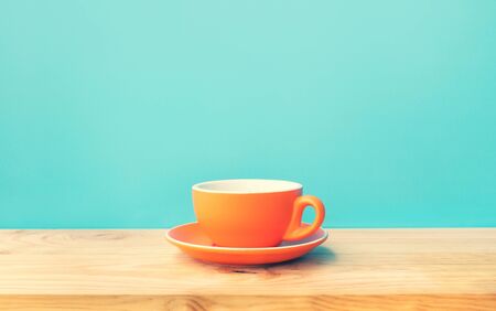 Inspiration creativity concepts with a cup of coffee on wood bar table background.Drinking and...