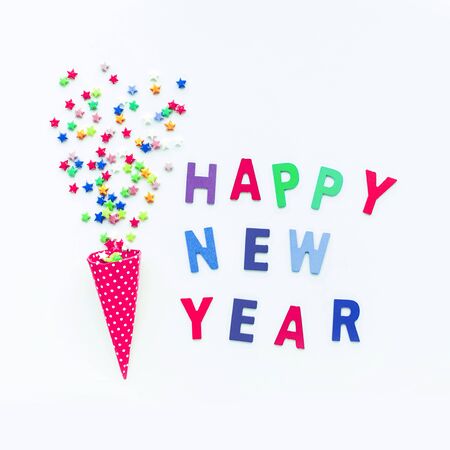 Happy new year concepts ideas with confetti from colorful star shapeの写真素材