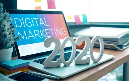 2020, smart goal concepts with mock up text number on computer laptop on desk table and window...