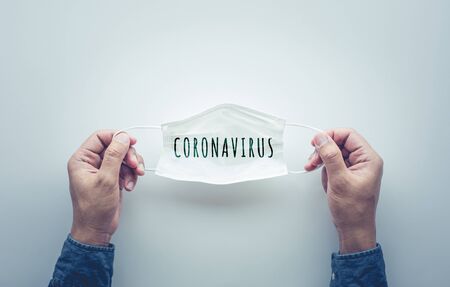 Protect yourself with mask in coronavirus outbreak  around the world .body health care.medical equipment.demand and supply.hope and solution.big change situationの写真素材