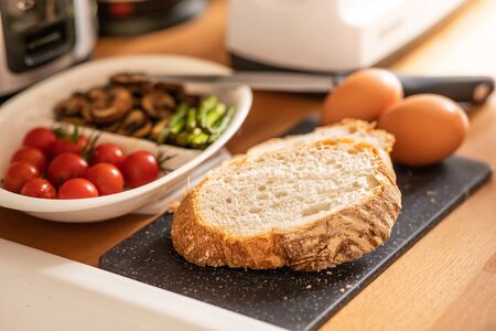 Selective focus of breakfast menu on kitchen counter bar in morning.Healthy food,simple eating...