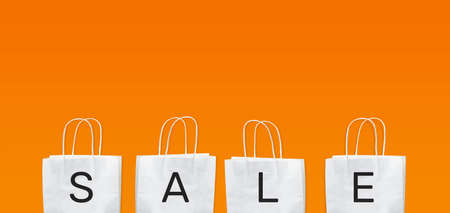 Special sale and black friday festival concepts with text on white shopping bag on yellow background.copy spaceの写真素材