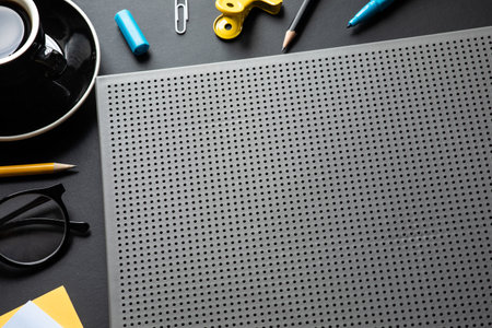 Modern worktable in black color background.creativity spaceの写真素材