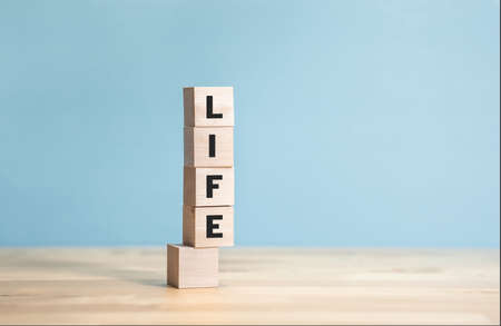 Life,balance concepts with text on wood block.strong or control concepts.copy space