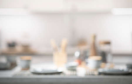 Blur of kitchenware on table in kitchen room.For background ads design.の写真素材
