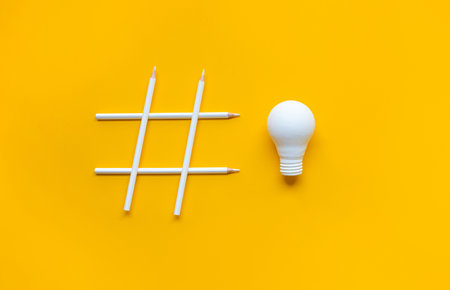 Social media and creativity concepts with Hashtag sign made of pencil and lightbulb.digital marketing images.power of conversation.の写真素材