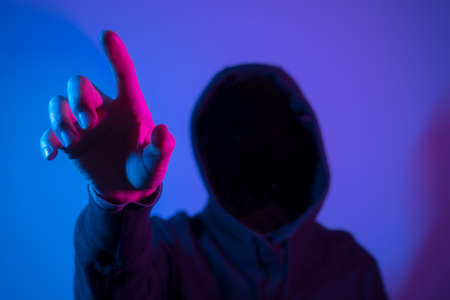 Hacker is woking, touching the screen, Break through the security networkの写真素材