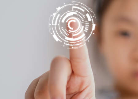 litter girl touching the future of artificial intelligenceの写真素材