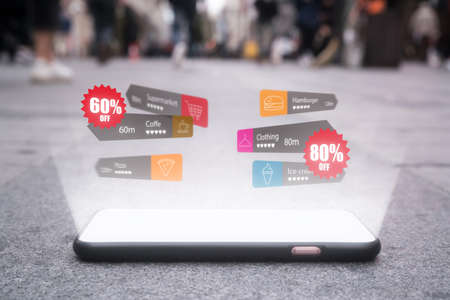 Smartphone lie on the ground, Augmented reality technology in the futureの写真素材