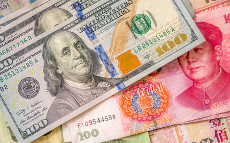 currencies of dollar, yuan and another moneyの写真素材