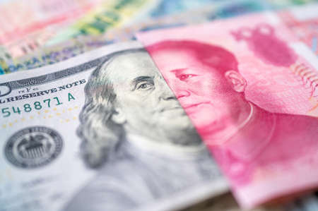 currencies of dollar, yuan and another moneyの写真素材