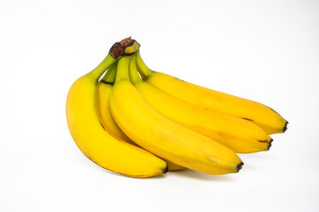 single yellow banana with white backgroundの写真素材