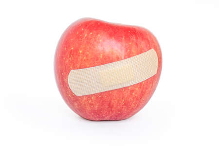 stick to the red appleの写真素材