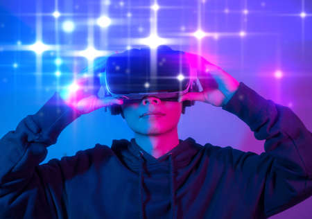 Digital composite of Man wearing VR Virtual Reality Headset with Interface, Future technology concept.の写真素材
