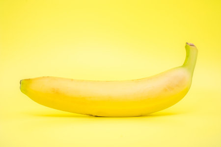 Yellow bananas with yellow backgroundの写真素材