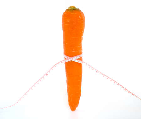 ruler measure the Carrot, The concept of healthy dietの写真素材