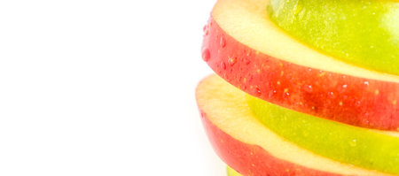 red apple and green apple slicesの写真素材