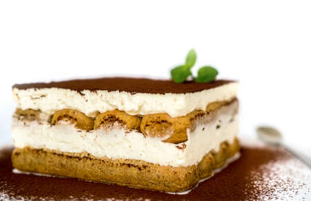 Fresh Tiramisu Cake, white backgroundの写真素材