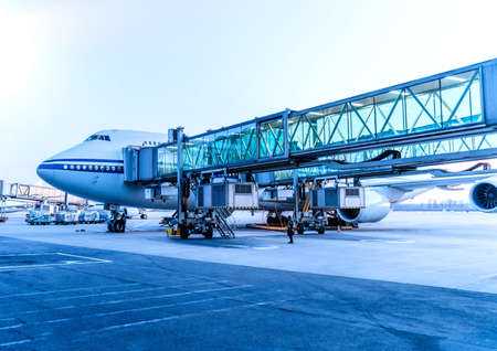 Aircraft ready for boarding in sunshineのeditorial素材