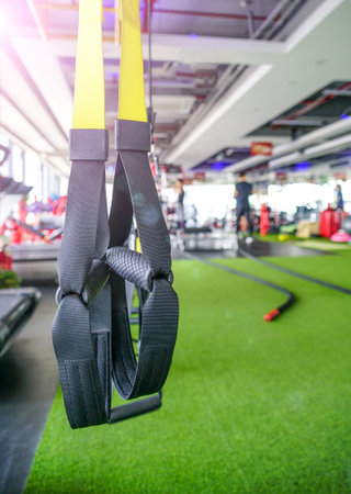 gym morning, sunshine coming, Suspension Trainer waiting for usingの写真素材