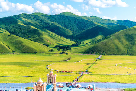 Plain, grasslands, river and mountain landscapeのeditorial素材