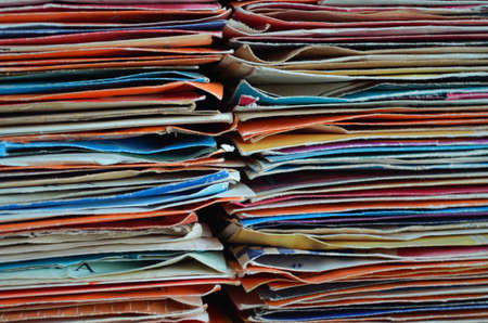 Stacks of  vinyl record singles in their original sleeves