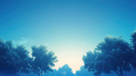 A vibrant blue sky with trees standing tall underneath, the gradient of blue shades creating a serene, nature-inspired sceneの素材