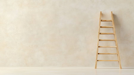A wooden ladder stands against a minimalist beige wall, creating a serene atmosphere perfect for home improvement, design projects, or artistic inspiration.の素材