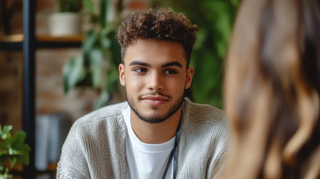 Student in therapy session with a counselor, depicting a peaceful setting for compassionate conversation and emotional supportの素材