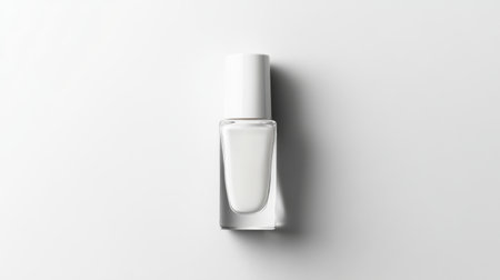Nail polish bottle with a transparent cap placed centrally on a white background, dynamic focus on style and simplicityの素材