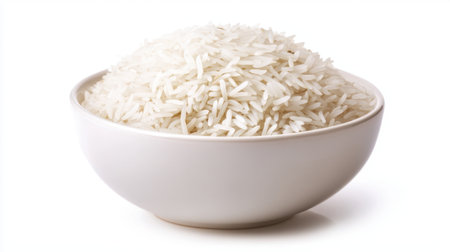 Freshly prepared basmati rice in a white bowl, isolated on a clean white background, ideal for food presentationsの素材