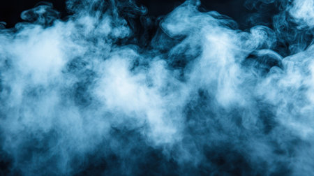 Thin wisps of bluish white smoke rising against a black backdrop, capturing a serene and mysterious ambiance.の素材