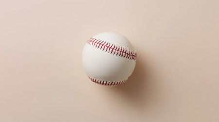 Baseball ball viewed from above, set against a simple background for a focused sports image.の素材