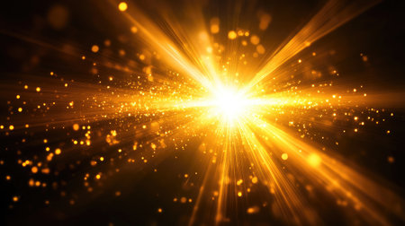 Abstract yellow and gold light rays form a glowing star flare effect on a deep black background, creating a dramatic scene.の素材
