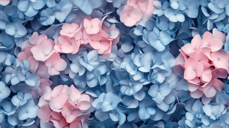 Vintage-style seamless pattern of hydrangea blossoms in shades of blue and pink, creating an elegant floral design.の素材