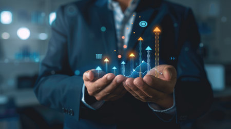 Businessman with a year goal icon in hand, illustrating digital marketing, finance management, and strategic investment growthの素材