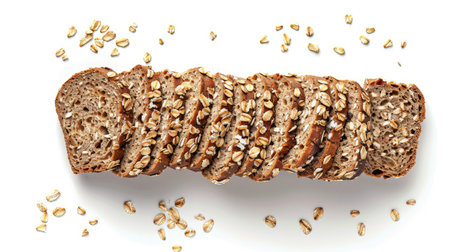 Sliced whole grain bread with oat flakes on a white background, highlighting its wholesome textureの素材