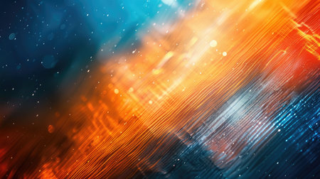 Dynamic blue and orange light background with texture overlay, offering a vibrant visual for creative projectsの素材