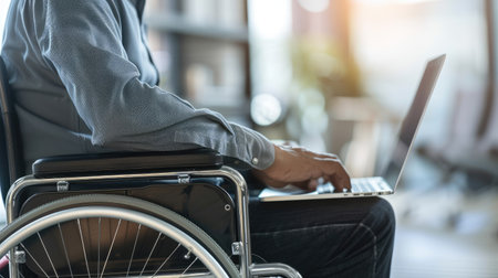 Person using assistive technology to read and respond to emails, emphasizing email accessibility.の素材