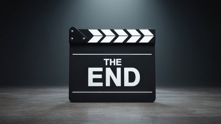 A cinematic clapperboard displaying the phrase "The End" symbolizes the conclusion of a film production. Shot in a dark studio with dramatic lighting. Perfect for film-related projects.の素材