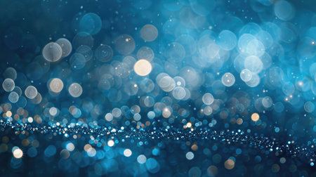 Sparkling blue gradient backdrop with delicate bokeh lights, perfect for elegant and high-end design needsの素材